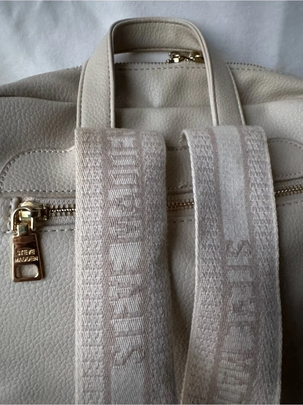 Steve Madden Cream Quilted Logo Backpack with Tassel
